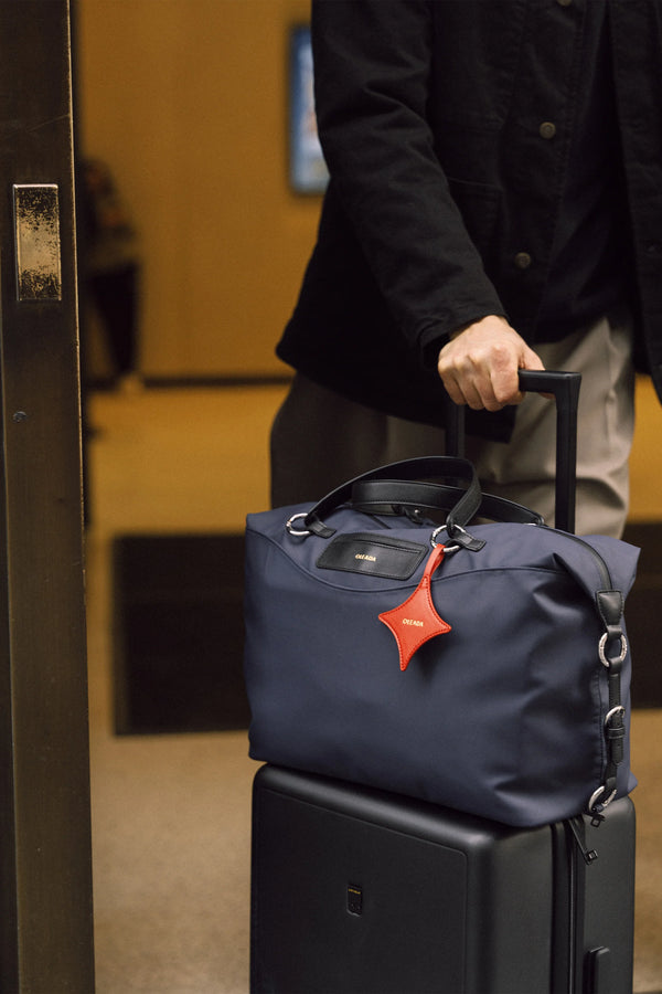 Anywear Duffle: Recycled Leather & Waterproof High-density Technical Fabric