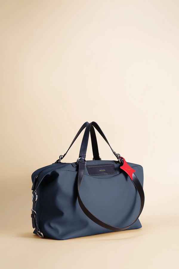Anywear Duffle: Recycled Leather & Waterproof High-density Technical Fabric