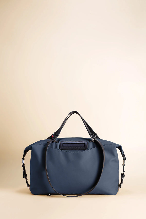 Anywear Duffle: Recycled Leather & Waterproof High-density Technical Fabric