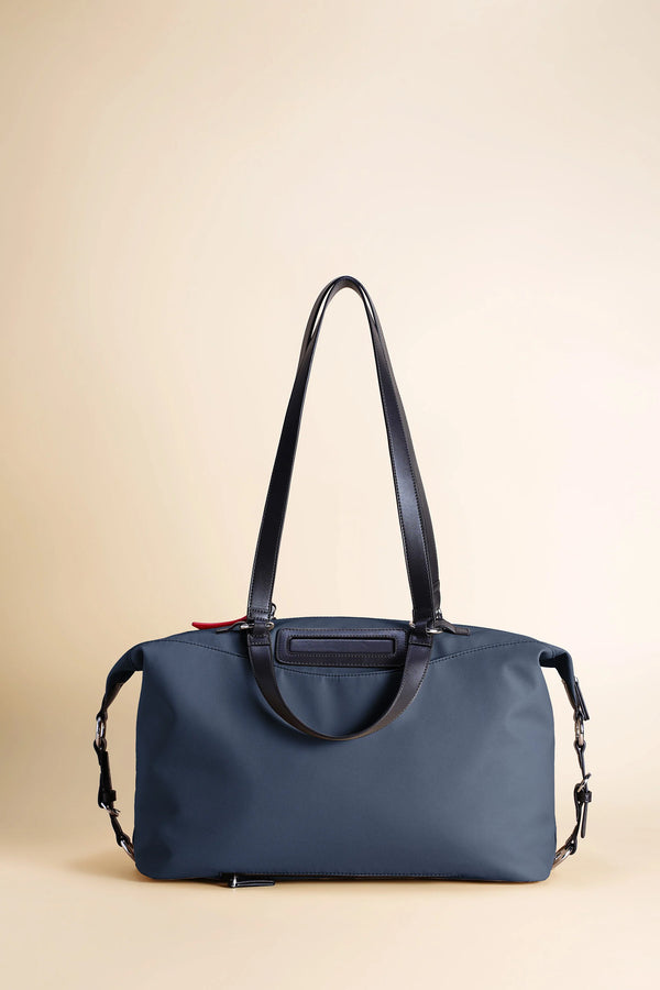 Anywear Duffle: Recycled Leather & Waterproof High-density Technical Fabric