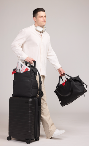 Anywear Duffle: Recycled Leather & Waterproof High-density Technical Fabric