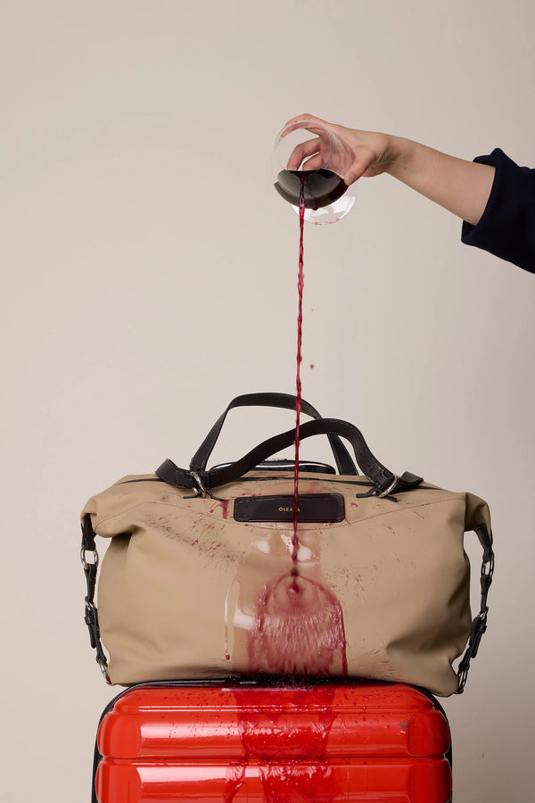 Anywear Duffle: Recycled Leather & Waterproof High-density Technical Fabric