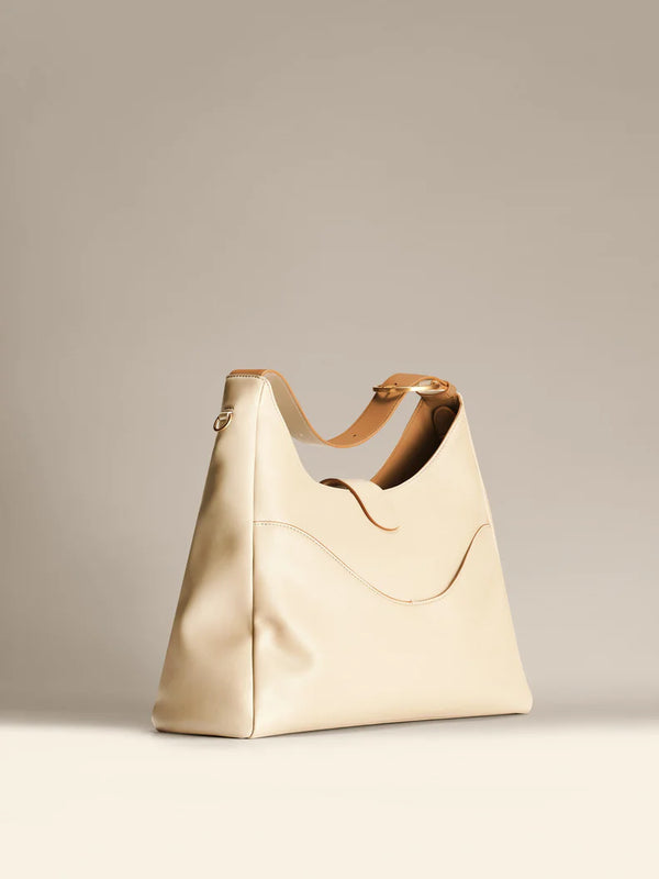 Reverie Hobo: Sustainable Leather, Fits 16" Laptop