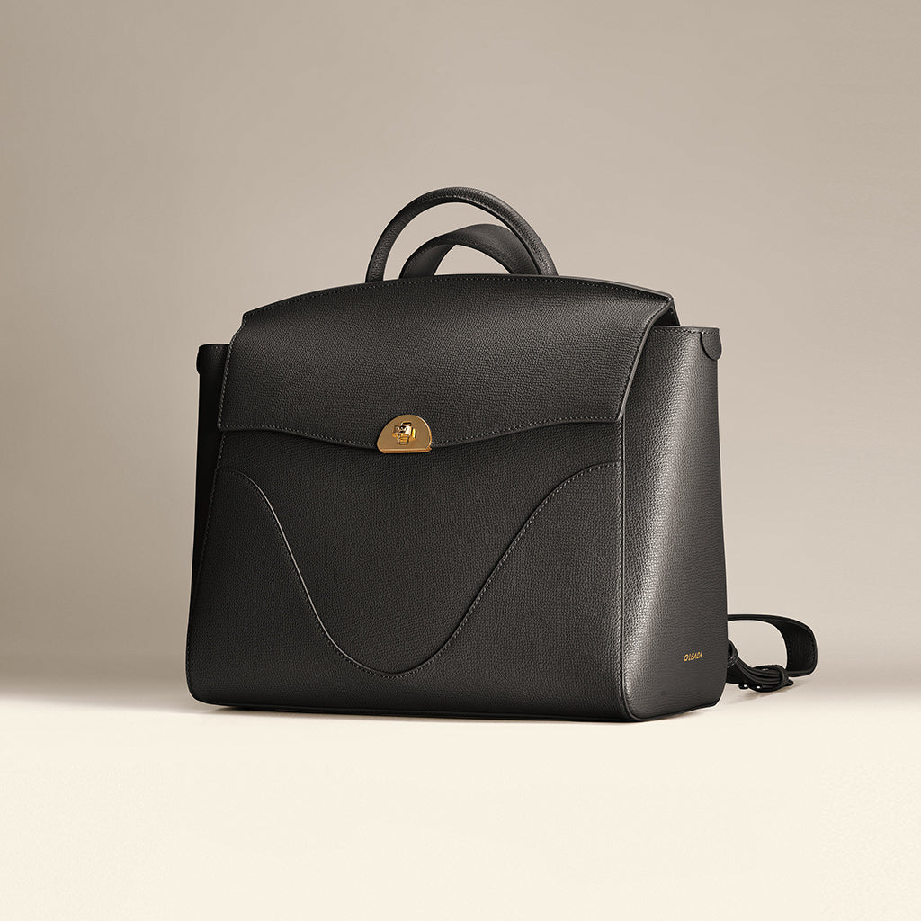 3-in-1 Style Leather Backpack. Fits 16