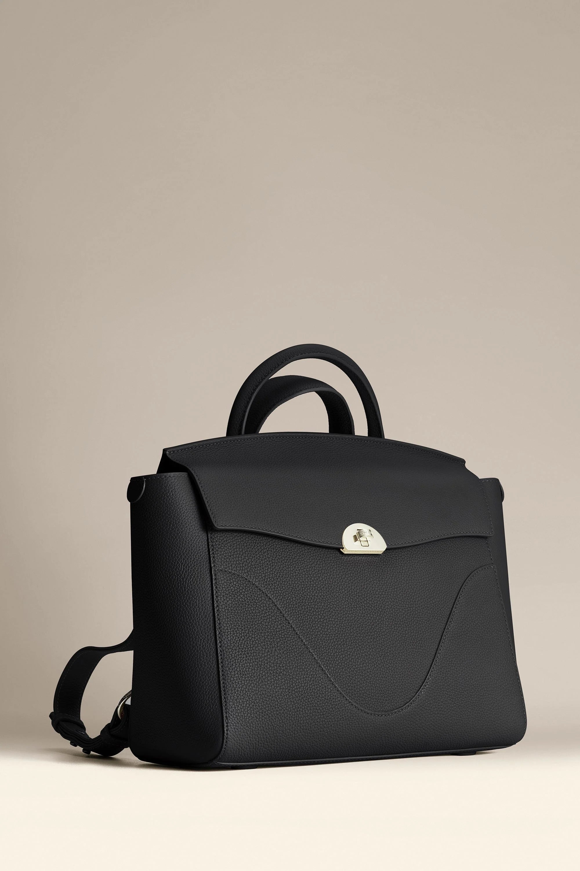 3-in-1 Style Backpack: Made With Sustainable Vegan Leather. Fits 16" in Laptop
