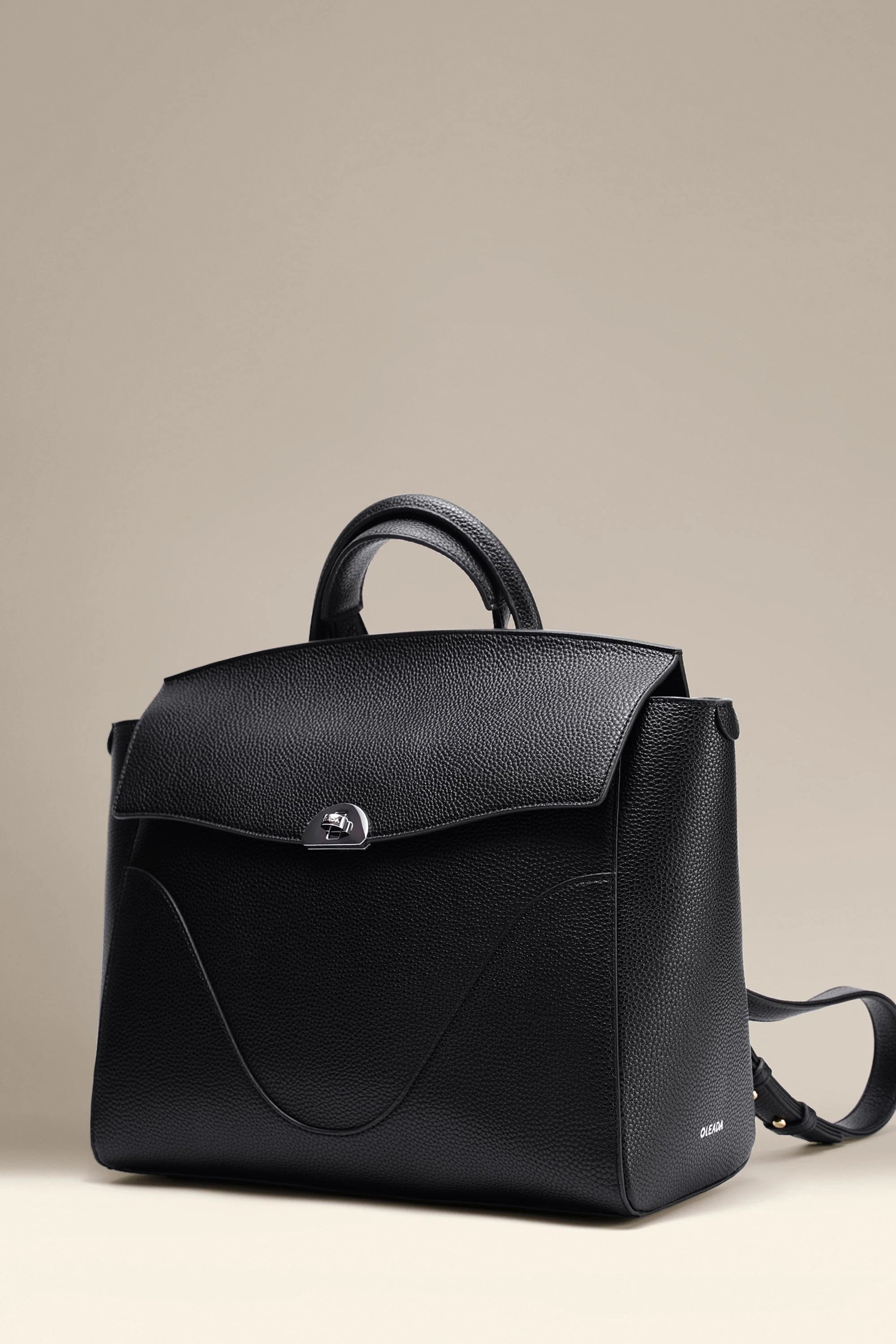 3-in-1 Style Backpack: Made With Sustainable Vegan Leather. Fits 16" in Laptop