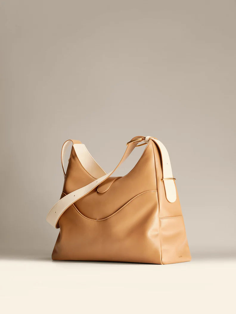 Reverie Hobo: Sustainable Leather, Fits 16" Laptop