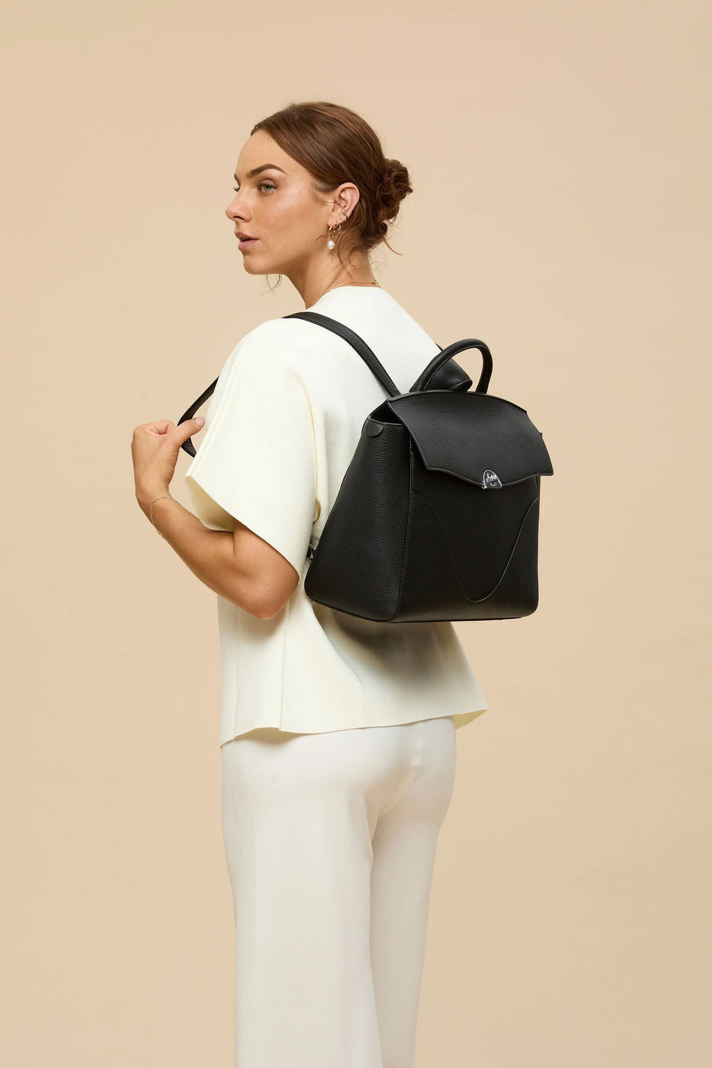 3-in-1 Style Backpack: Made With Sustainable Vegan Leather. Fits 16" in Laptop