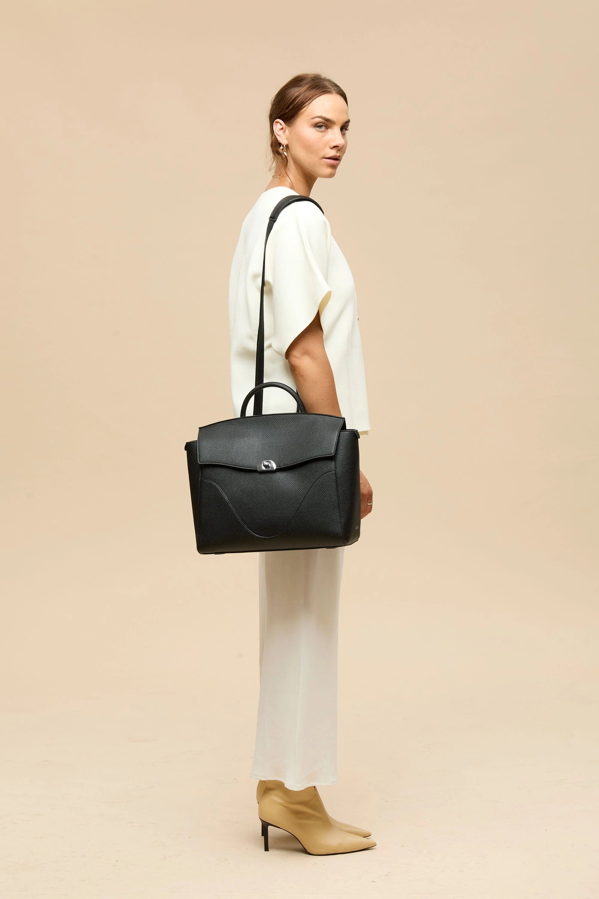 3-in-1 Style Backpack: Made With Sustainable Vegan Leather. Fits 16" in Laptop