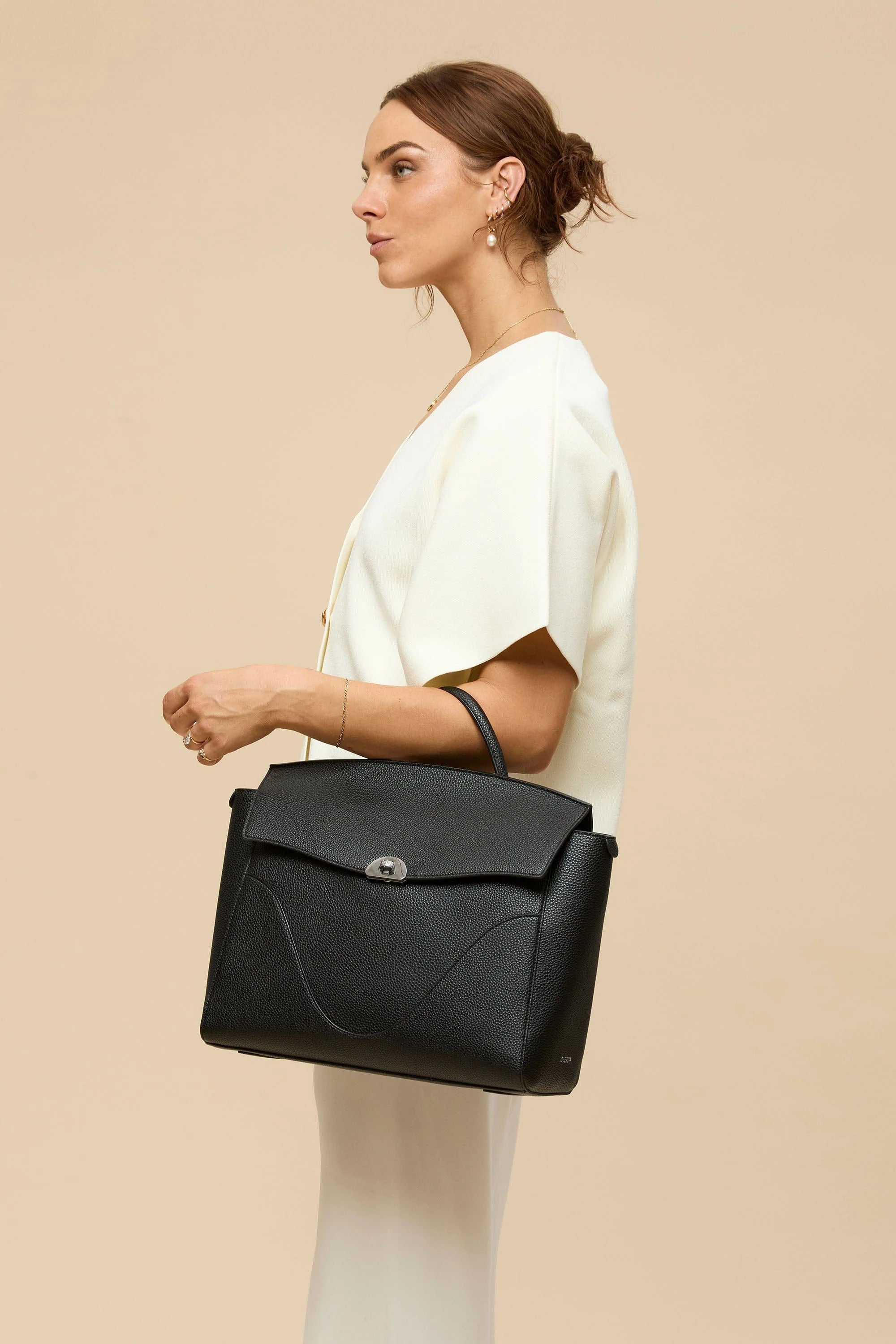 3-in-1 Style Backpack: Made With Sustainable Vegan Leather. Fits 16" in Laptop
