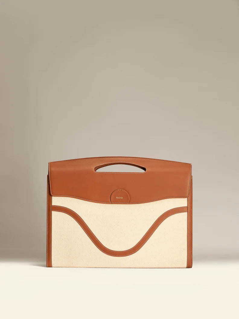 Custom Laptop Sleeve Program: Made With Recycled Leather. 50 Piece Minimum Order.